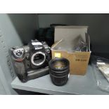 A Nikon D200 camera and accessories