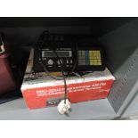 A Pro 2004 programmable AM/FM 300 channel scanner receiver