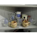 A selection of vintage branded water jugs etc