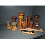 A selection of industrial mill and factory bobbins including Wilkinson Heysham