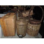 A selection of wicker items including pedal bin and hamper