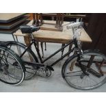 A vintage all steel framed 2030 Raleigh bicycle with Terry seat saddle