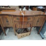 A reproduction Regency serpentine front sideboard