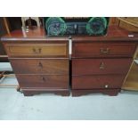 A pair of mahogany effect bedside drawers