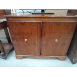 A reproduction Regency style yew effect side cabinet