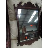 A late 19th Century mahogany wall mirror in the Chippendale revival style