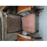 A vintage low seat armchair