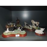 A selection of Border Fine Arts style figures and collection of Wade figures