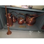 A selection of fire side items including copper coal bucket and stove kettles