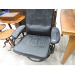 A modern swivel chair, black leatherette