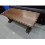 A mid to late 20th Century oak coffee table