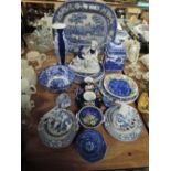 A selection of blue and white wear ceramics including tea cups and saucers