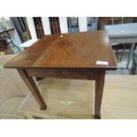 A traditional oak occasional table
