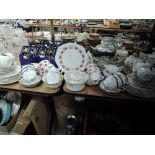 A selection of tea cup and saucer sets including Tuscan