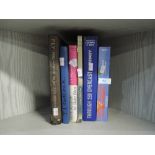 A selection of text and reference books including Flying and how to do it