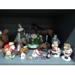 A selection of figures and figurines including cloisonne bell