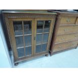 An early 20th Century oak bookcase/display