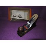 A woodworking plane with box
