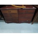 A pair of mahogany effect bedside drawers