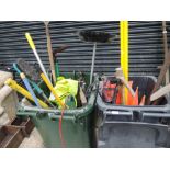 Two wheelie bins of tools