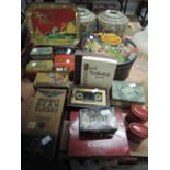 A selection of advertising tins including Lyons Gala Night Assortment and postbox