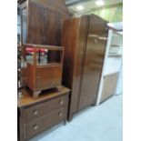 A vintage oak ply bedroom suite