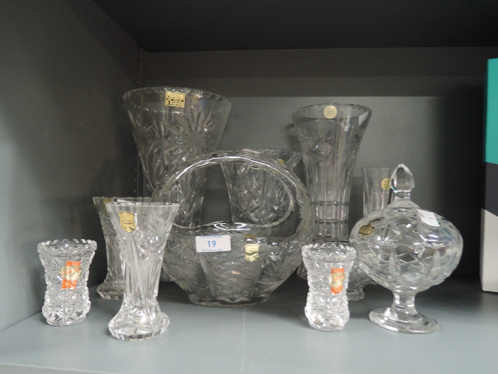 A selection of clear cut and crystal glass wares all named brands