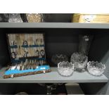 A selection of crystal glass wares and boxed cutlery