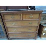 A Victorian stripped mahogany chest of two over three drawers