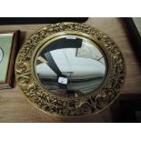 A gilt and decorated frame bullseye mirror