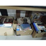 A selection of guide and reference books including military interest