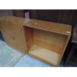 A vintage part golden oak low bookcase