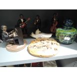 A figures set of Jazz band members and carved Chinese soap stone