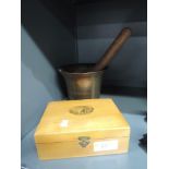 A 19th century mauchlinware treen box illustrated for Kendal and a vintage pestle and mortar