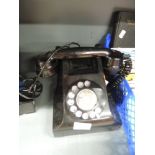 A replica bakelite style telephone