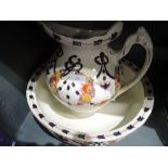 A large wash jug and bowl set with imari design