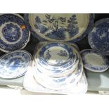 A selection of blue and white wear ceramics including chargers