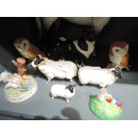 A selection of figures including Beswick sheep and owls