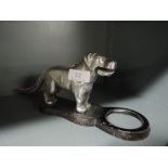 A cast and chromed dog design nut cracker