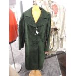 A vintage 1970s bottle green ladies suede coat in Good condition, small to medium size.