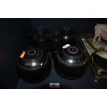 A set of bowls by Thomas Taylor and set of Arena Eschenbach binoculars