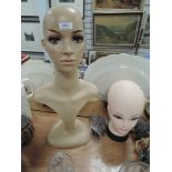 Two fashion shop display mannequin heads or dummys