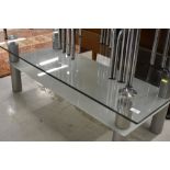 A modern glass coffee table/TV stand