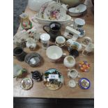 A selection of curios and trinkets including Sunderland lustre teacup and crested wares