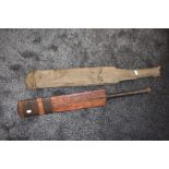 An early cricket bat made by Riley of Accrington with fitted case
