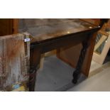 An early to mid 20th Centiry drawer leaf dining table