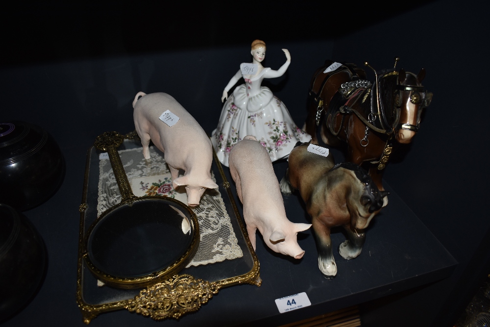 A selection of figurines including a Bretby horse , a dressing table ste etc