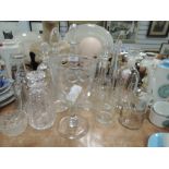 A selection of clear cut crystal glass wares including coronation goblet and decanters
