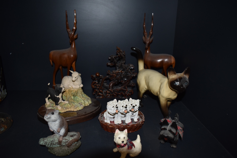 A selection of figurines including Border Fine Arts