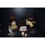 A selection of figurines including Border Fine Arts
